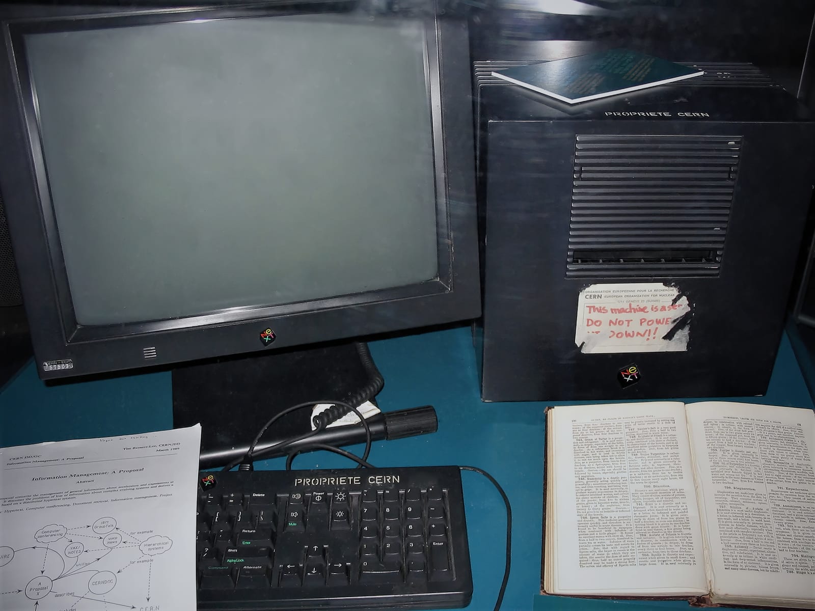 The black NeXT computer that ran the first website, with a hand-written do-not-power-down label